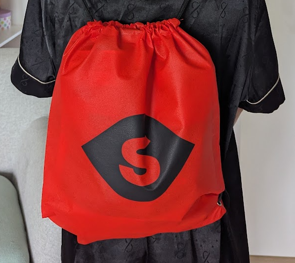 Festivalový batůžek jako dárek pro zákazníky stánku